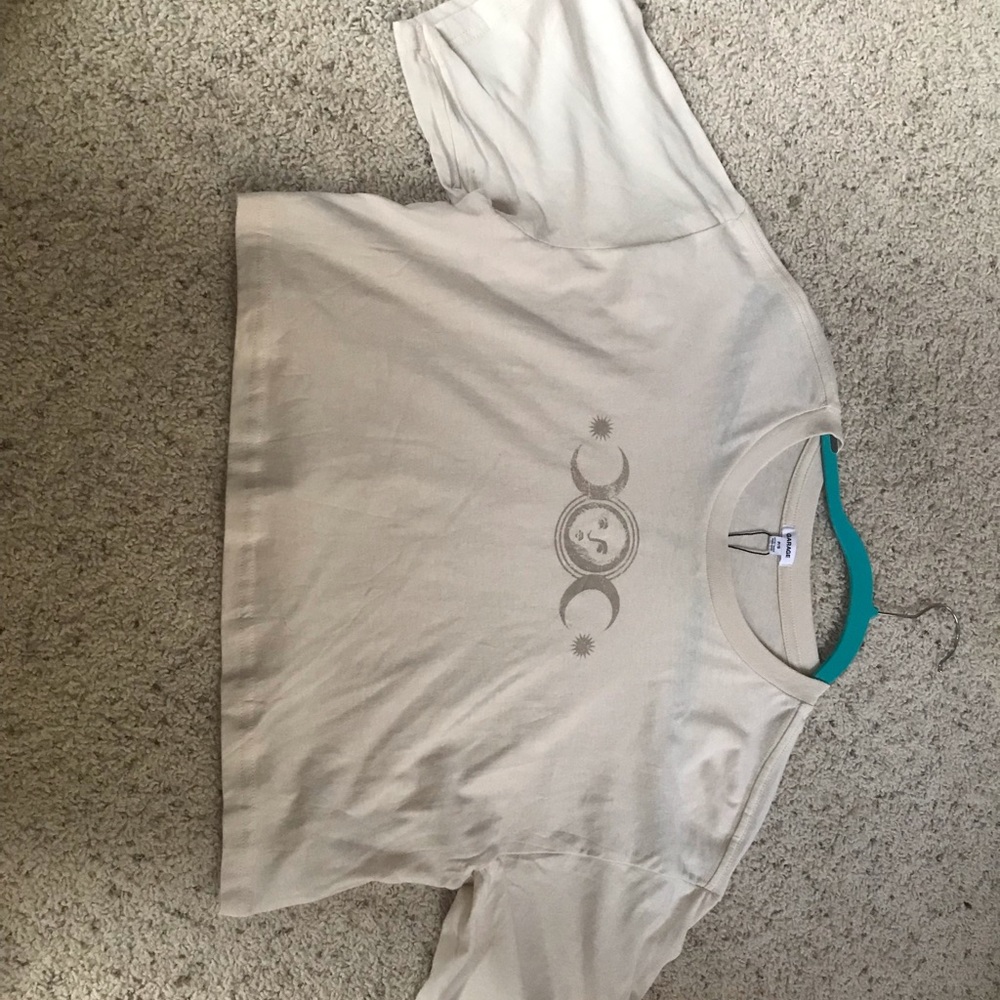 Small. Tag is still on. Cream color. Garage.